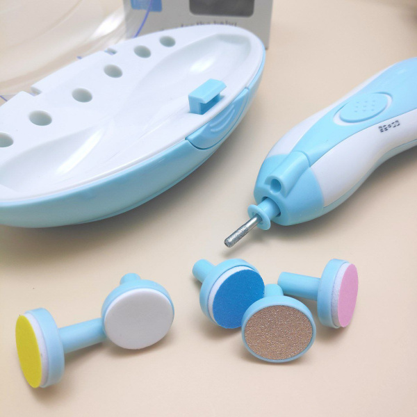 Устройство для подстригания ногтей детям Baby Nail Trimmer / Портативный детский триммер - пилочка для ногтей с 6 насадками